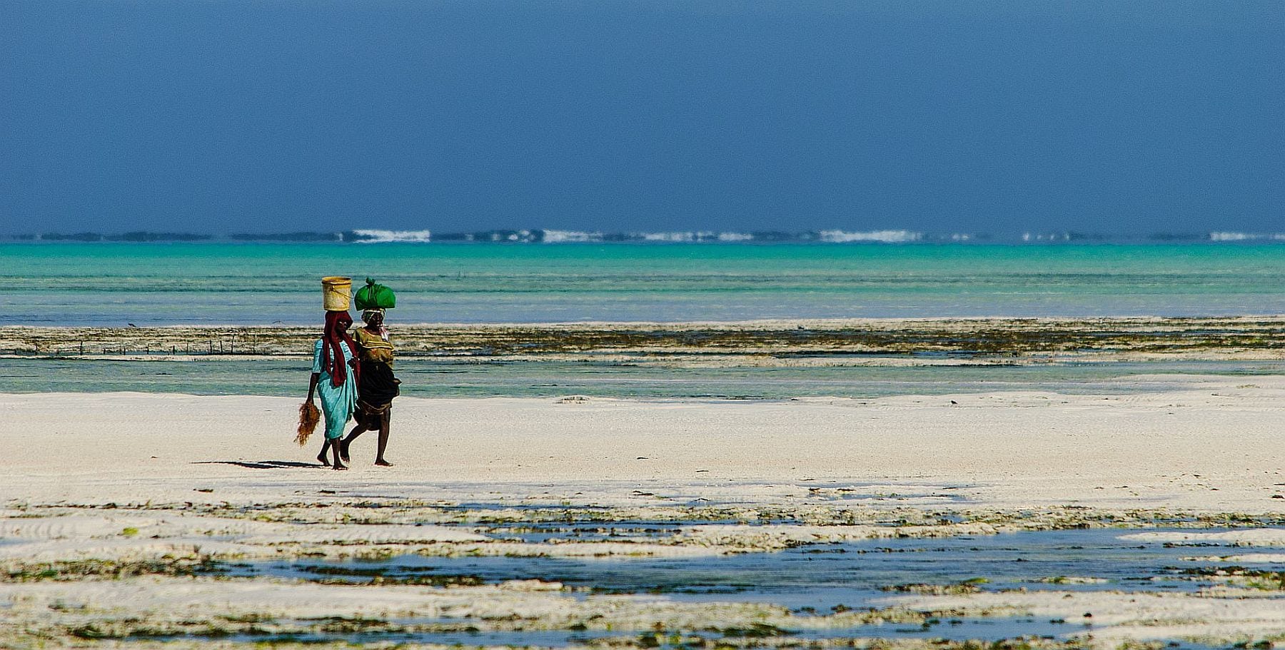 Ladies on beach near Stone Town Zanzibar