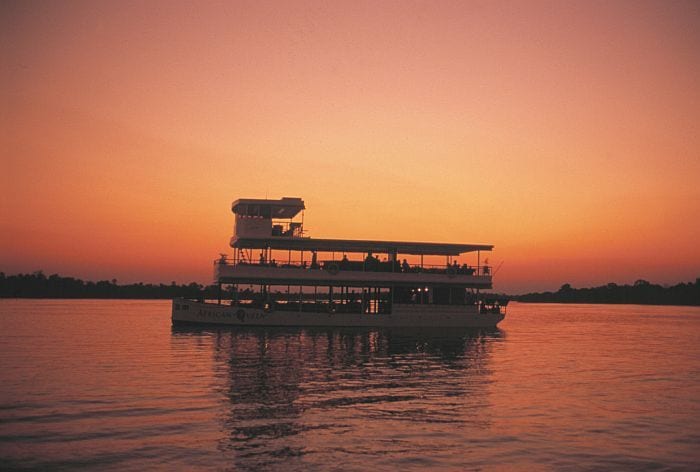 Reasons to enjoy a Zambia safari - sunset cruises near Victoria Falls on Zambezi river